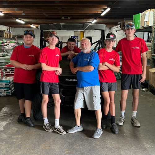 Old Time Farm Supply, Inc. staff inside the warehouse