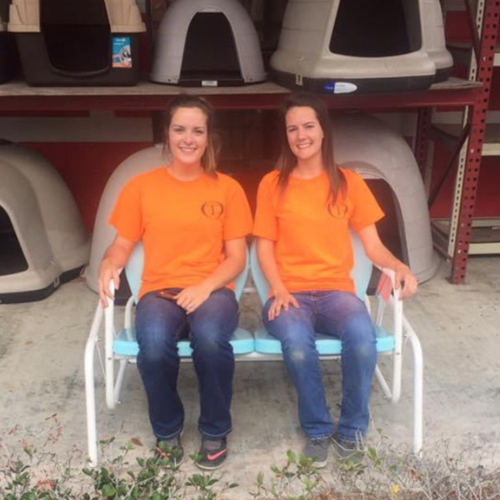 Old Time Farm Supply, Inc. staff outside of the store