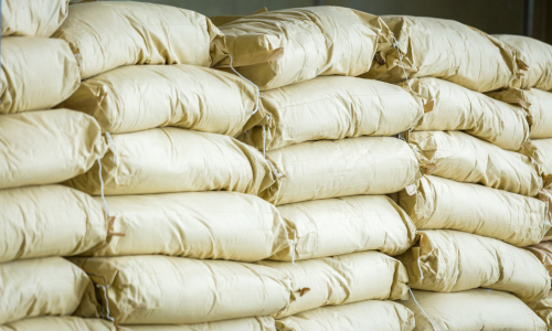 Stacks of bagged feed.