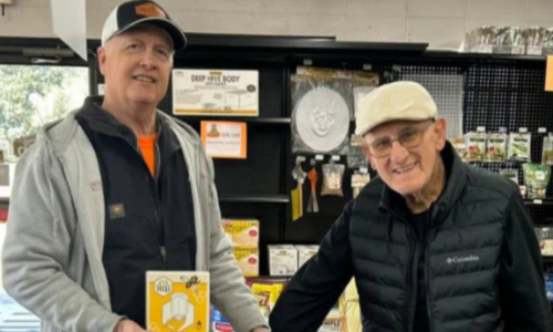 Old Time Farm Supply, Inc. customers inside the store.